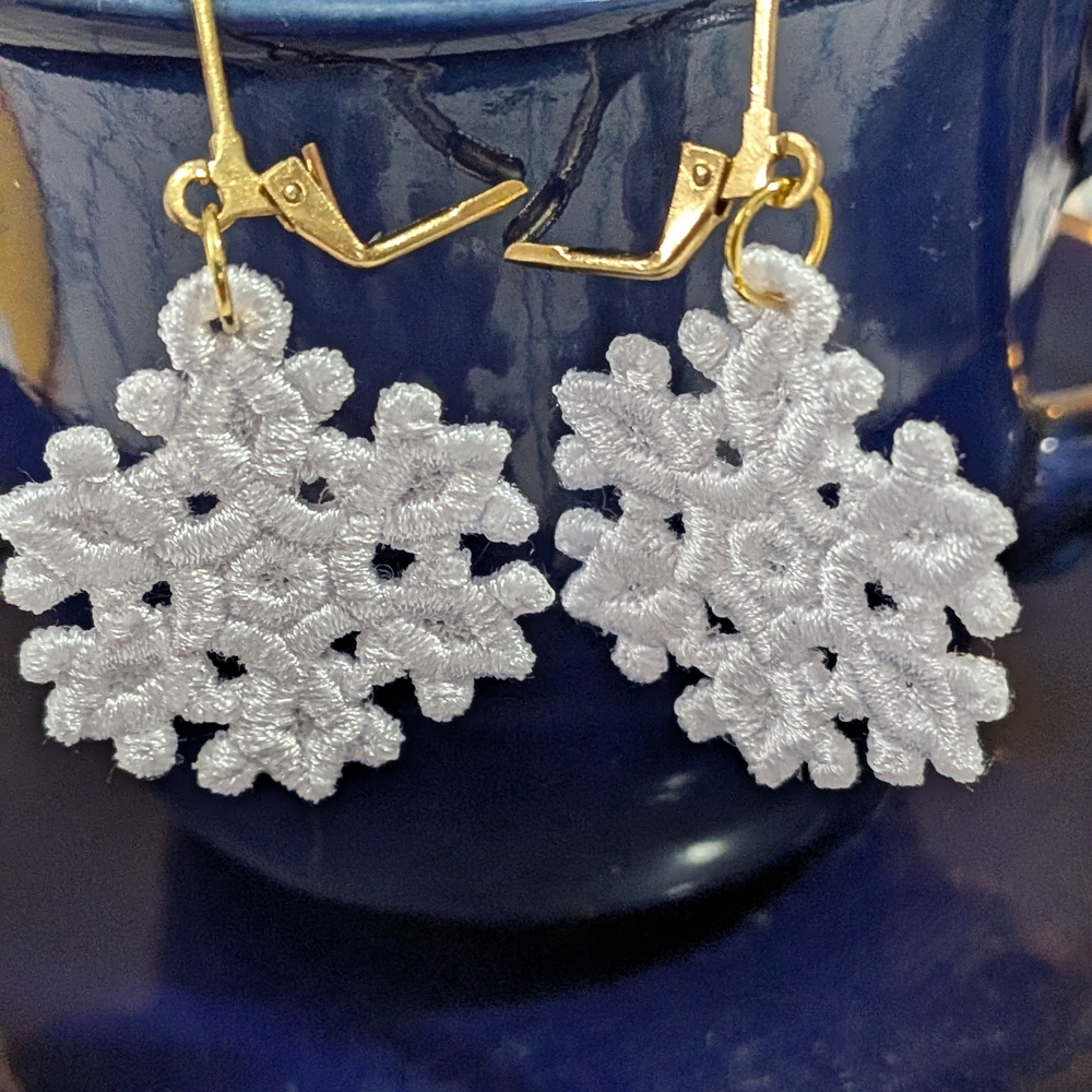 Elegant Snowflake Earrings in Silver and Gold